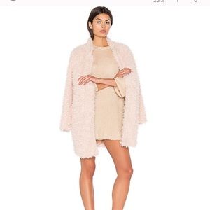 Bishop and young fuzzy pink coat